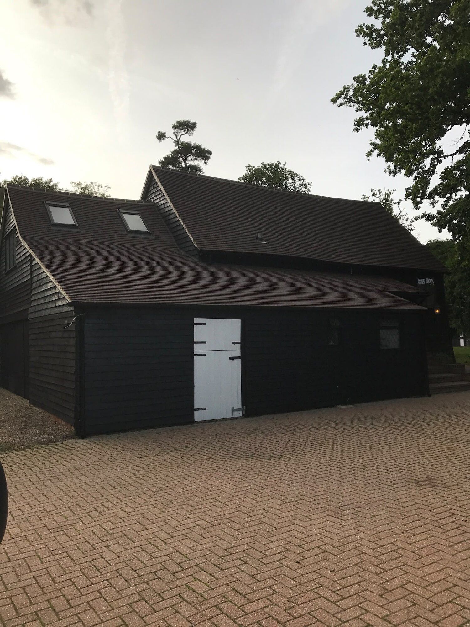 Black-clad outbuilding